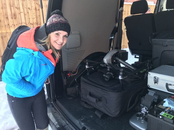Helen Skelton looking at our drone in the back of our VW Transporter