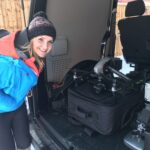 Helen Skelton looking at our drone in the back of our VW Transporter