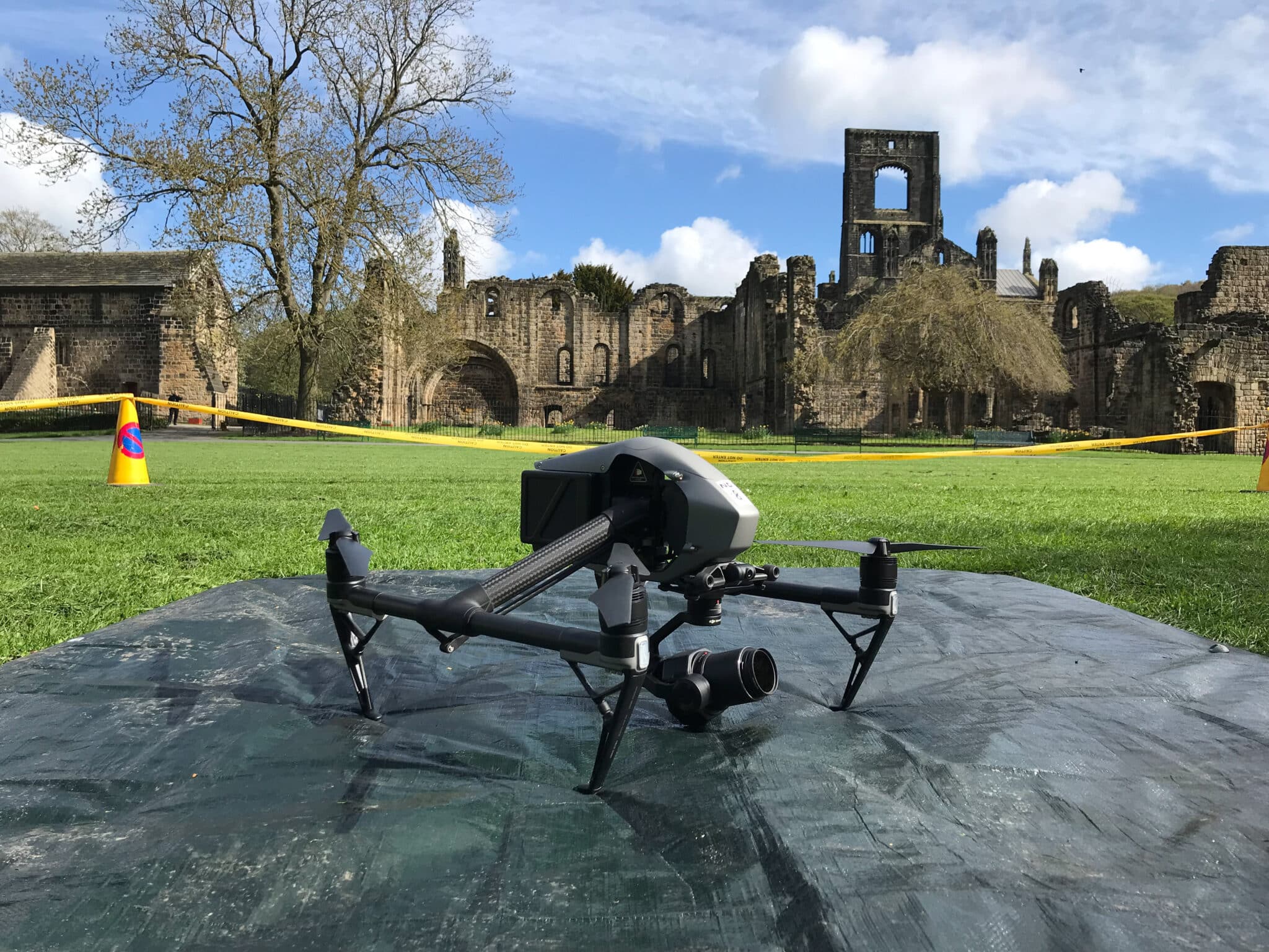 Cinema drone on location at a ruined abbey