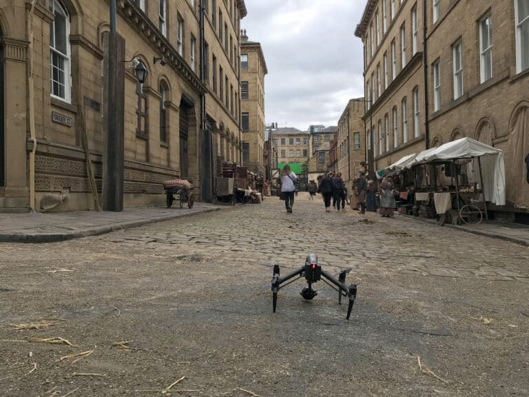 Drone filming on period street sets for Gentleman Jack in Yorkshire