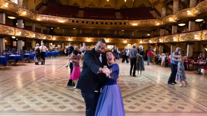 Rosie Jones and Guz Khan both comedians filming on Trip Hazard take a dance in the Tower Ballroom under Blackpool Tower.