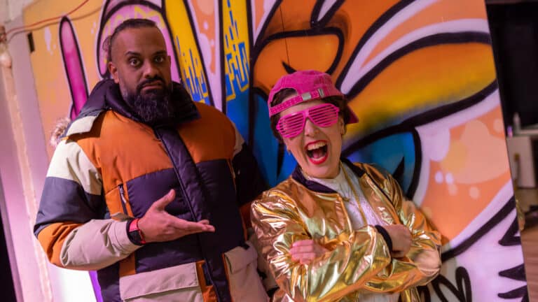 Guz Khan and Rosie Jones brake dance pose