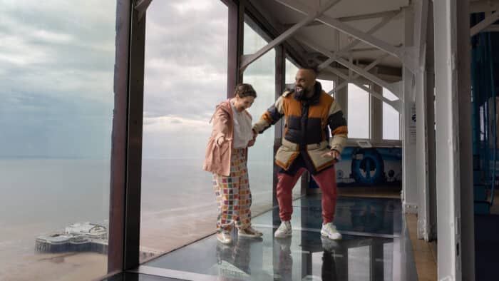 Guz Khan and Rosie Jones on the top of Blackpool Tower