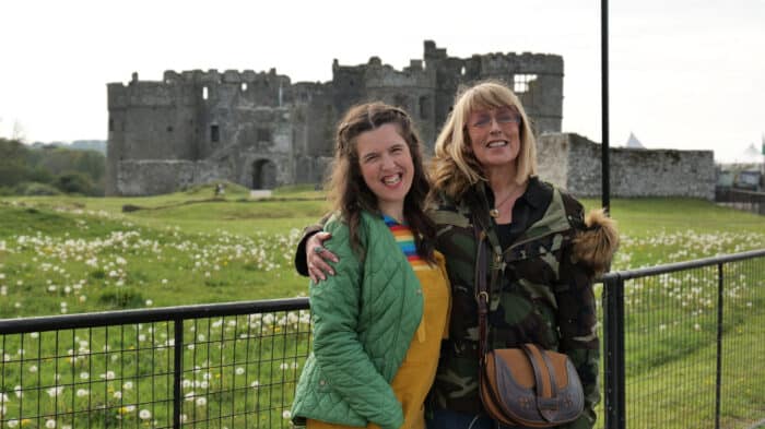 Rosie Jones and Fay Ripley pose outside a castle
