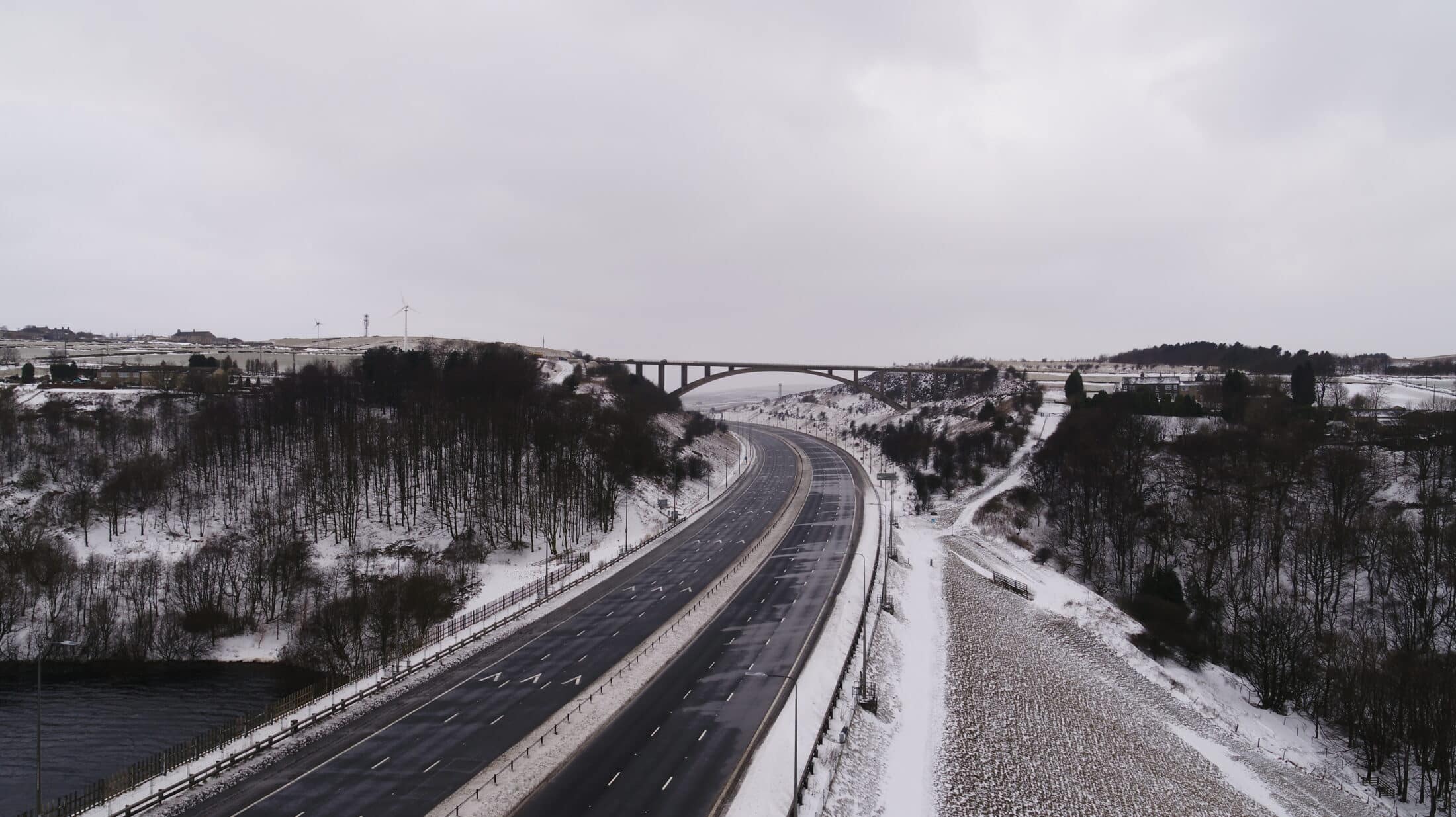 Aerial view of the M62 motorway closed by snow