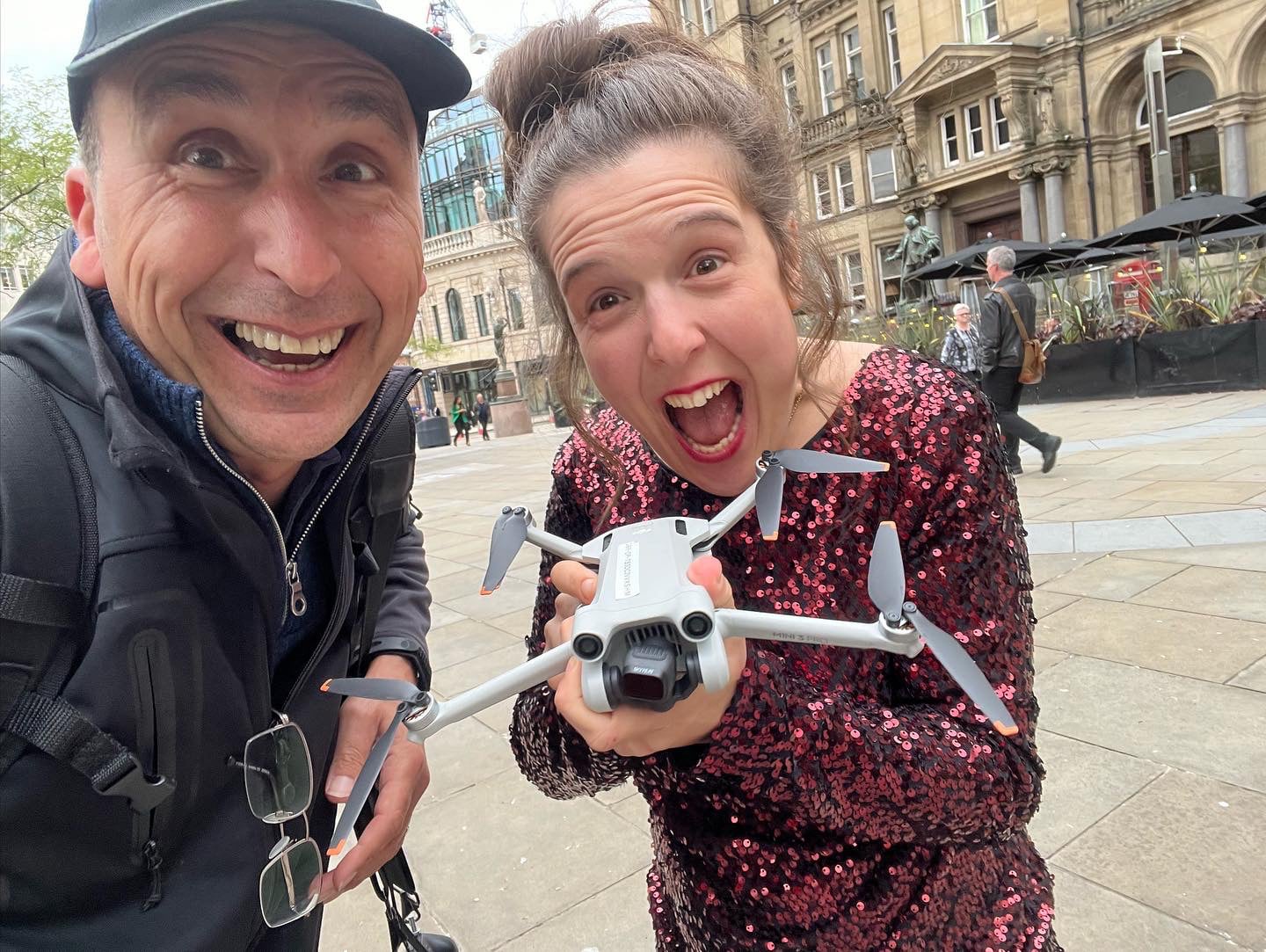 Phil Fearnley and Rosie Jones holding the DJI Mavic mini 3 whilst filming