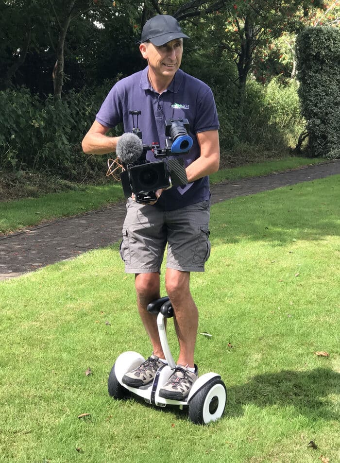 Image of Phil Fearnley using a Ninebot Segway whilst holding a Sony FX6 camera
