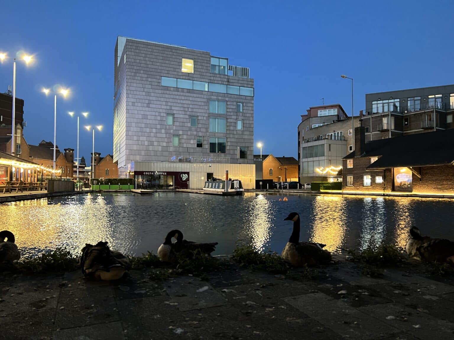 City waterfront at dusk, filmed for Canal Boat Diaries