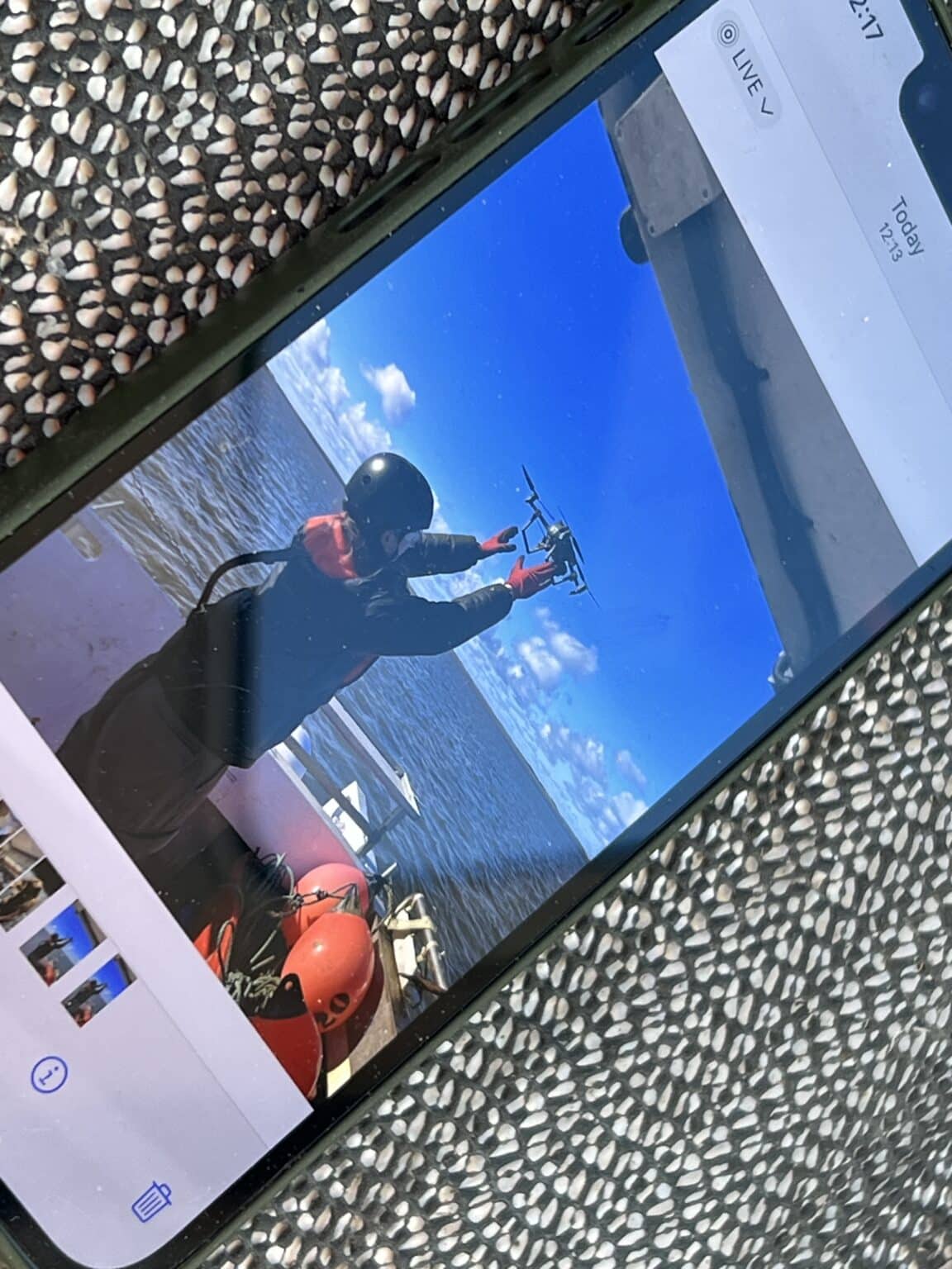 The drone on the monitor during a boat shoot