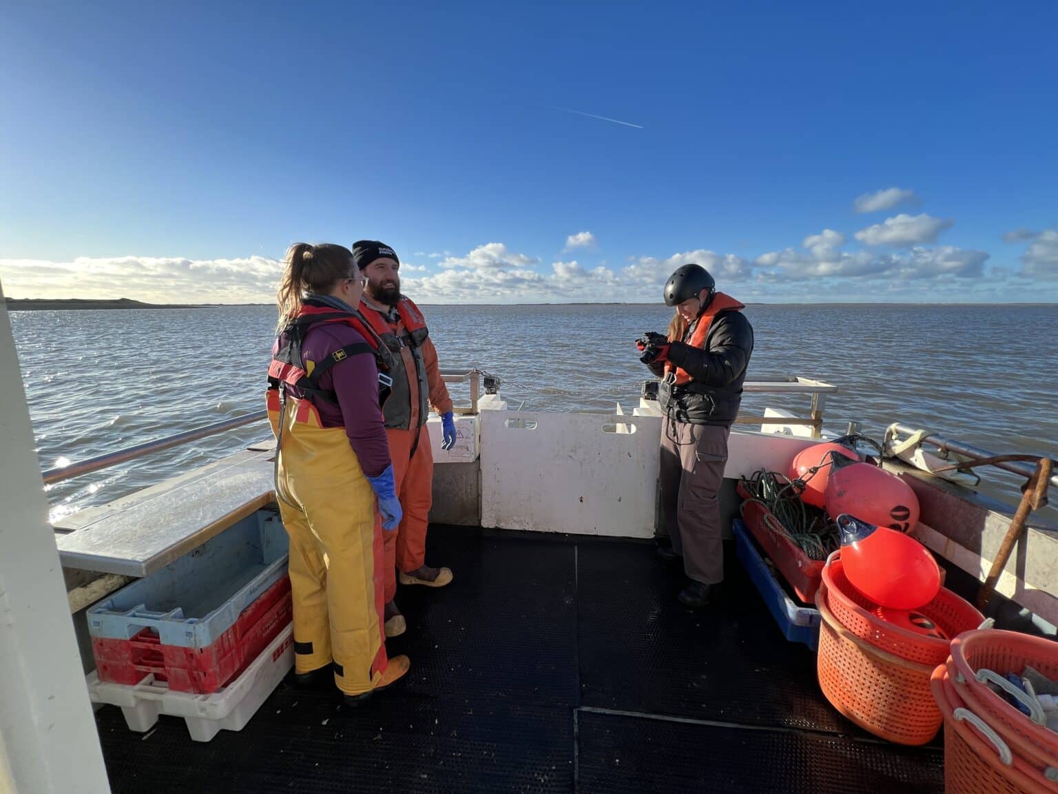 Crew on deck during a boat shoot