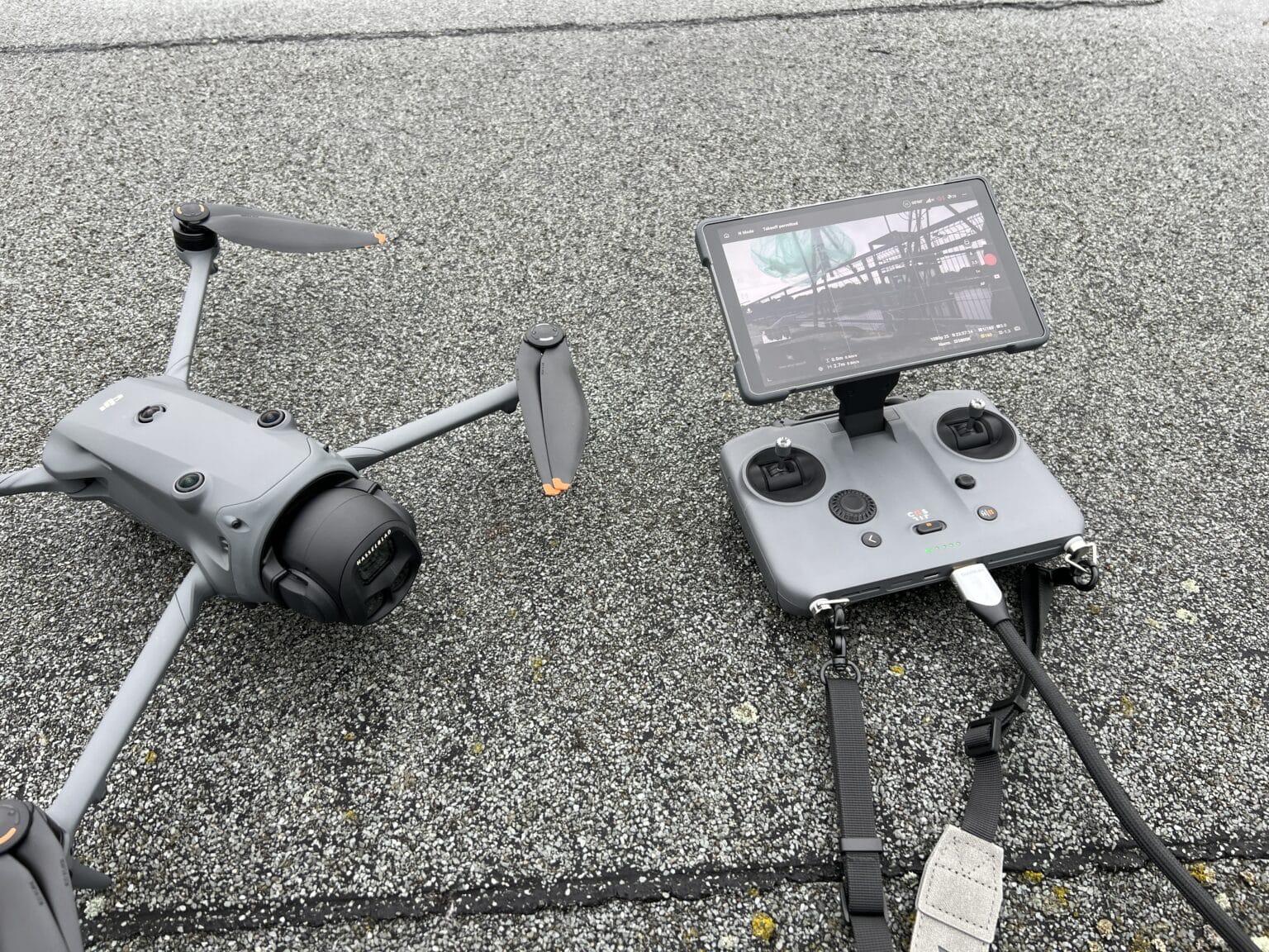 Two DJI drones ready to fly