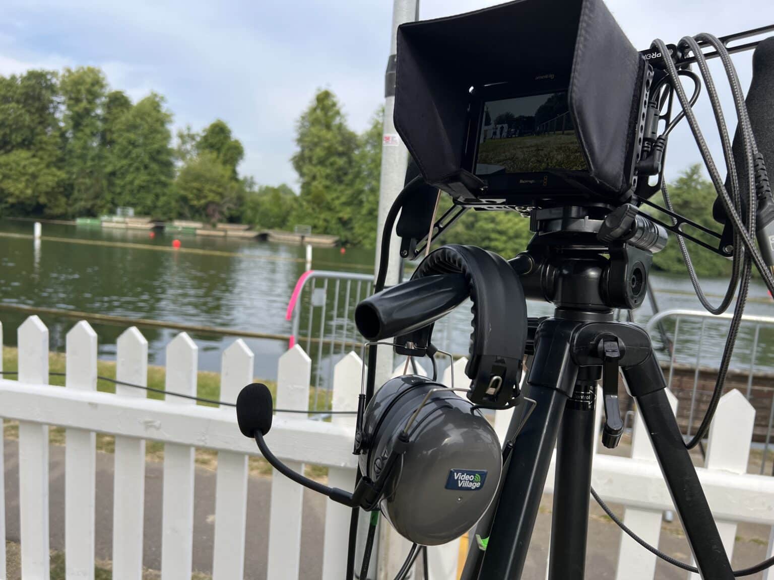A broadcast camera on the riverbank at Henley