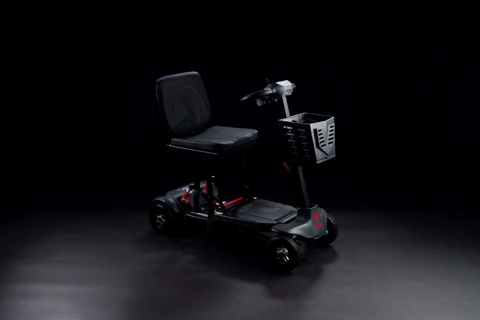 Monarch Mobility Genie photographed on a black background in the Halo Vue studio
