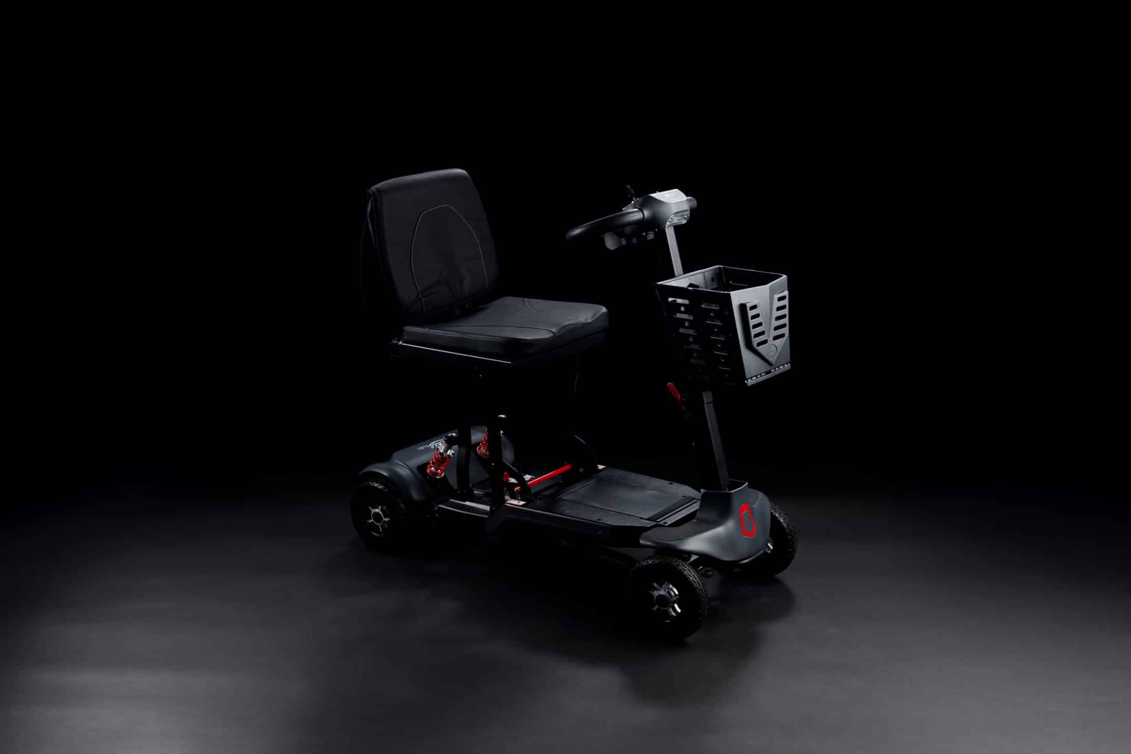 Monarch Mobility Genie product photographed on black background
