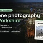 Drone photography in Yorkshire – Halo Vue featured in Yorkshire Life Magazine, aerial view of a floodlit tower at dusk