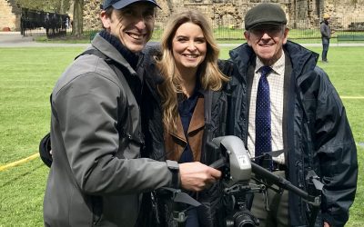Emmerdale star Emma Atkins and Dougie Brown stood with Phil Fearnley filming with the drone